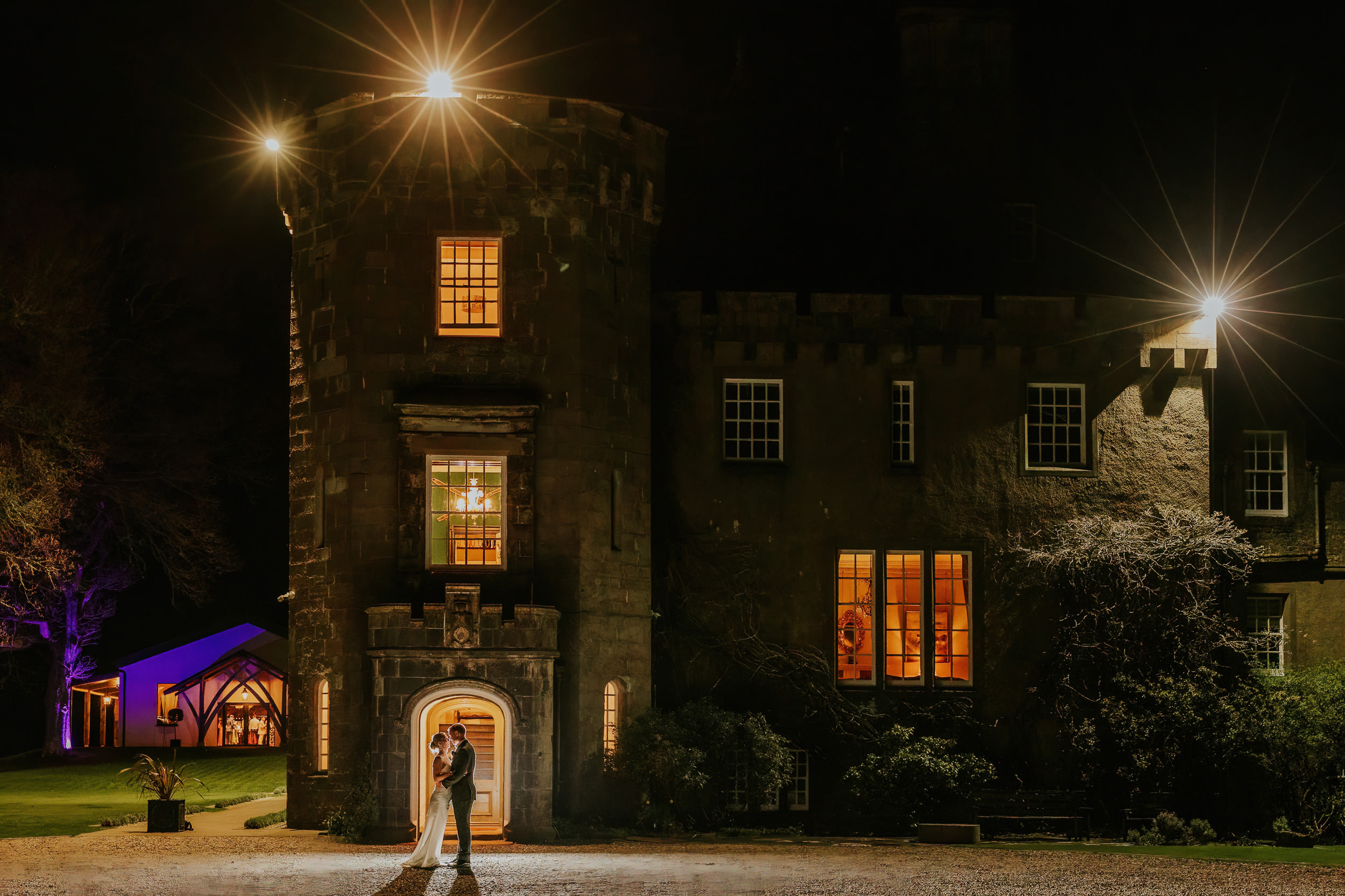 Evening portraits of couple at Boturich Castle reception pavilion