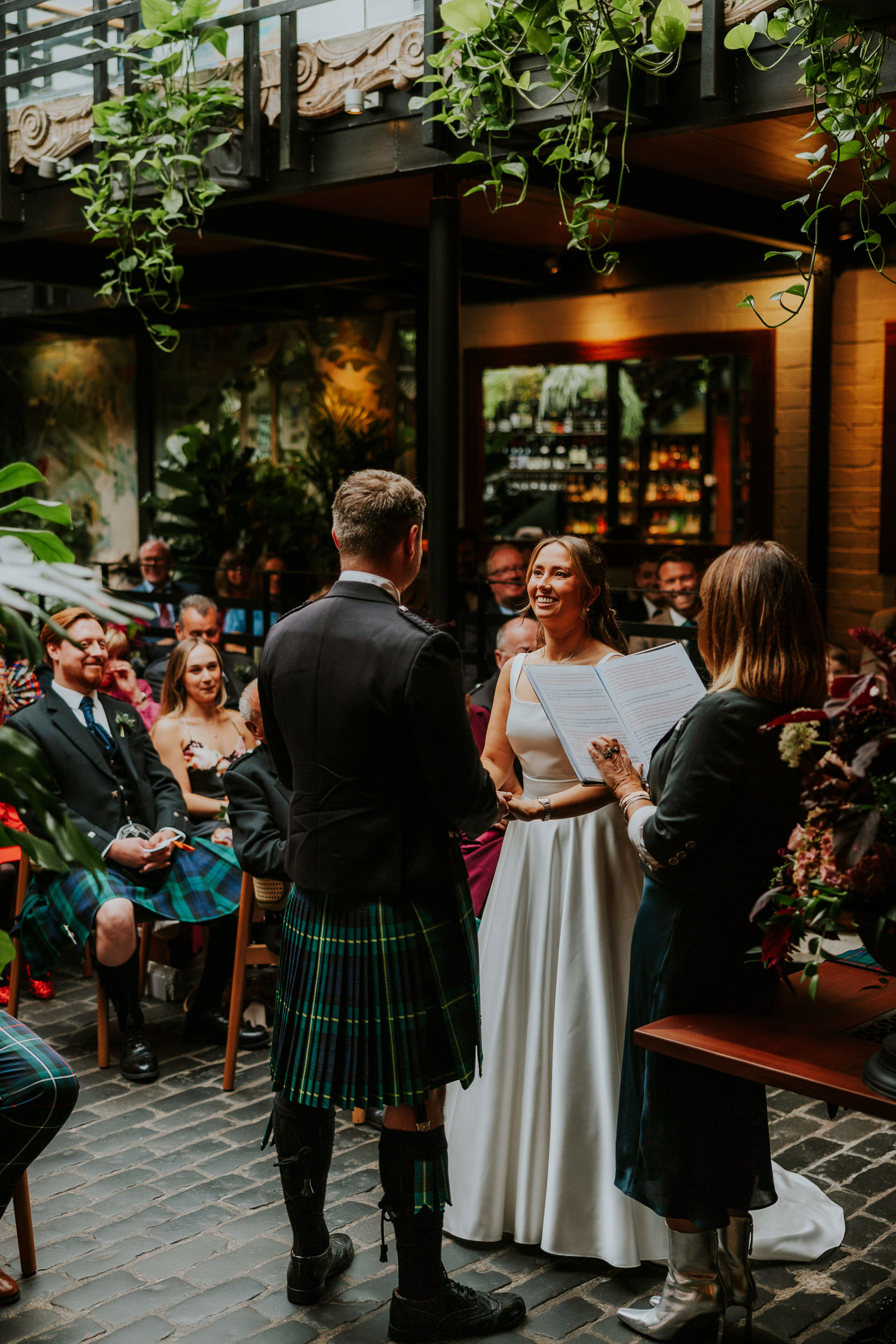 Wedding ceremony at Ubiquitous Chip in Glasgow conducted by Carol Smillie