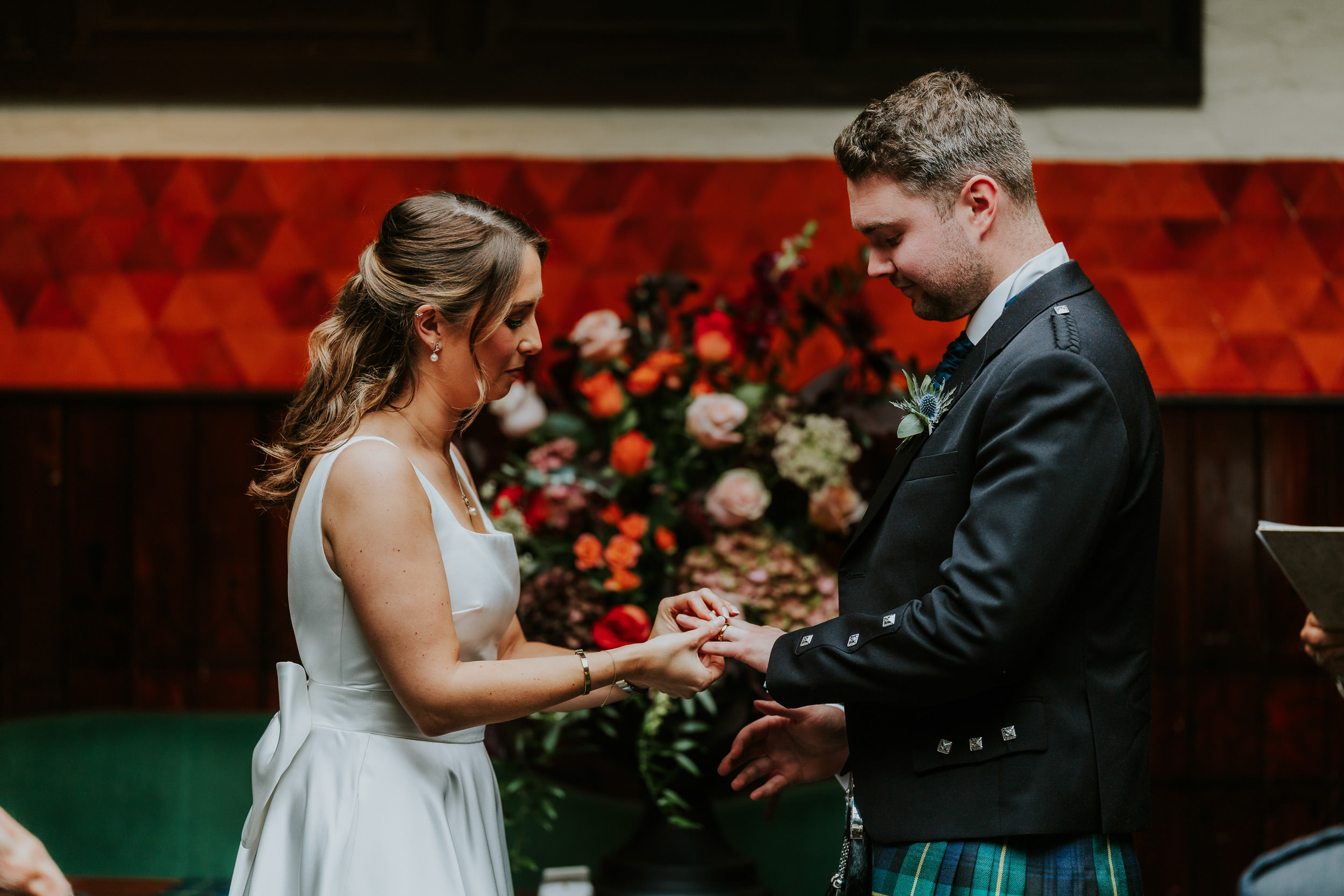 Ring exchange at Ubiquitous Chip in Glasgow wedding