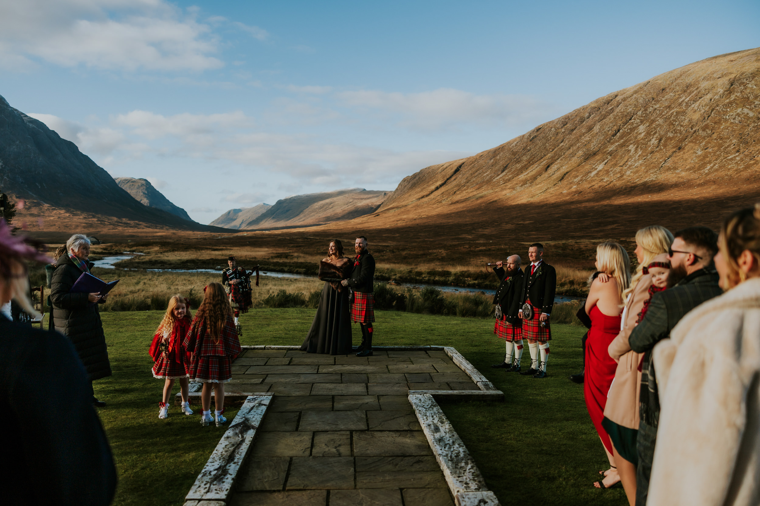 Bride and Groom getting married outdoors at the Kingshouse Hotel 