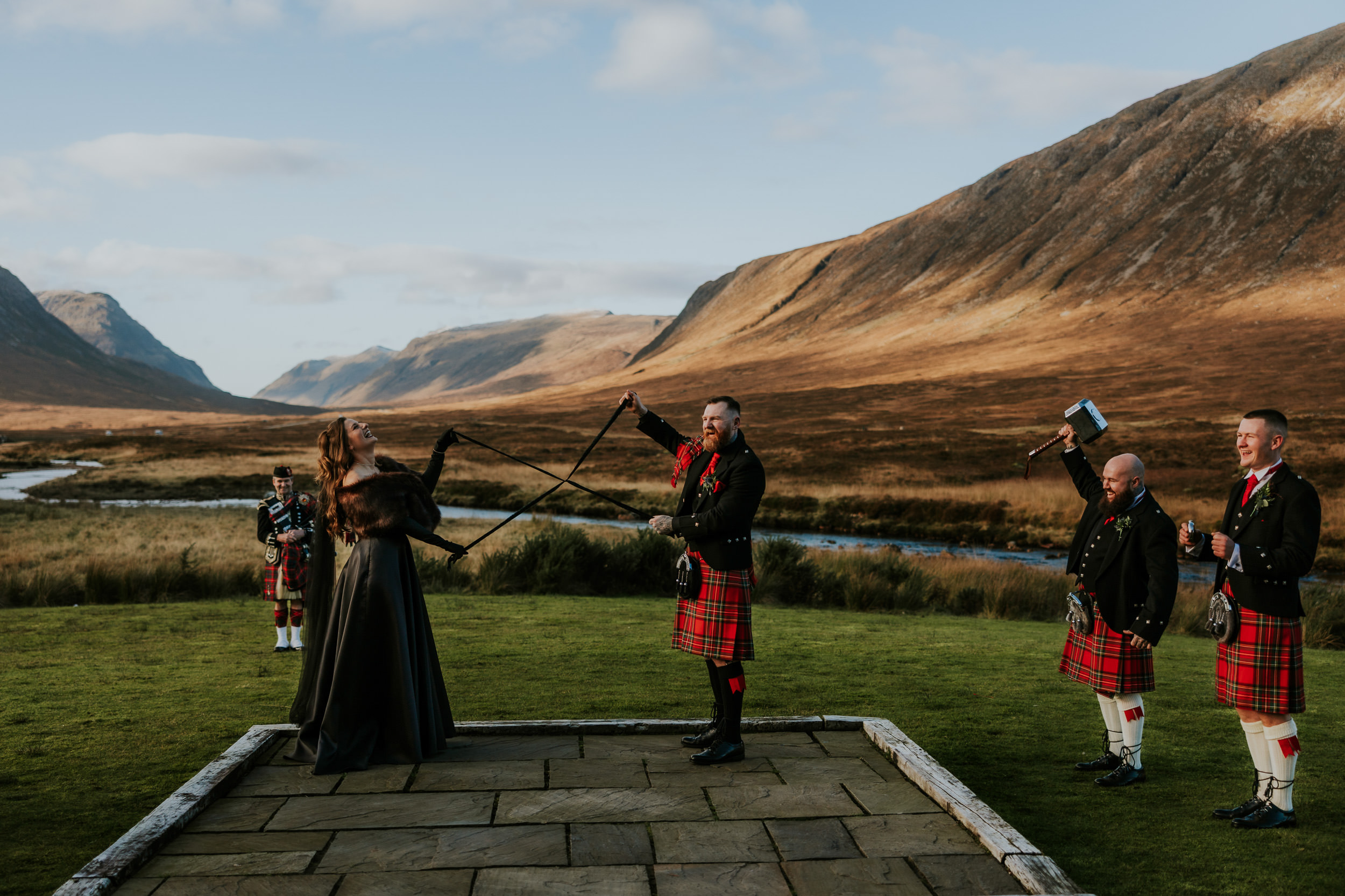 Bride and Groom getting married outdoors at the Kingshouse Hotel 