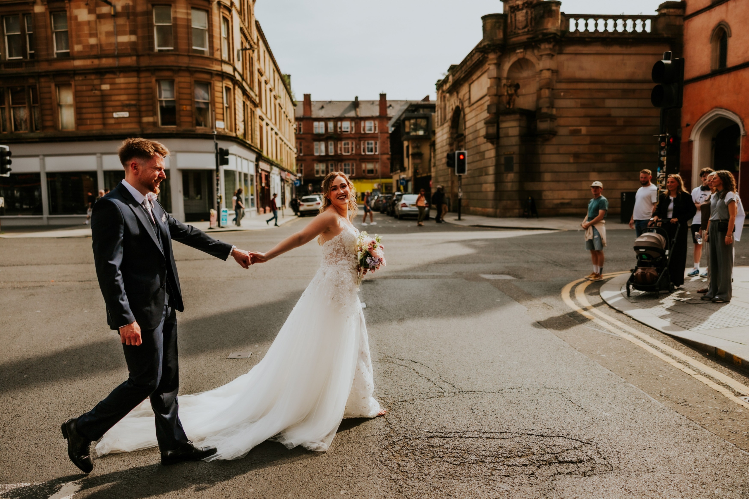 Lucy and John’s wedding at Arta 1 Bride and Groom crossing the road after getting married at Arta Glasgow