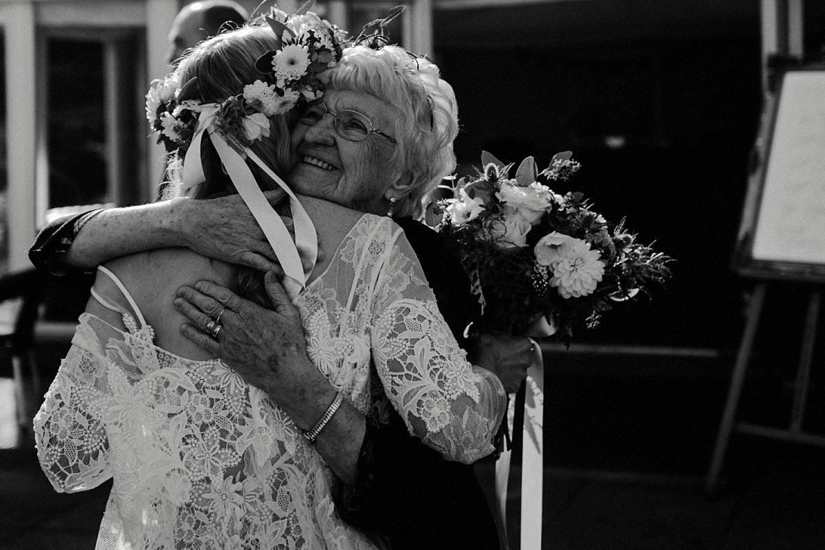 Bride and Gran hugging at wedding